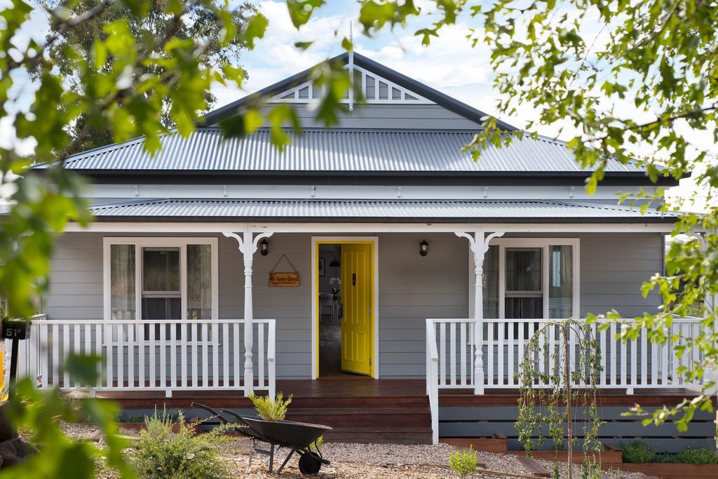Avoca home with bright yellow door
